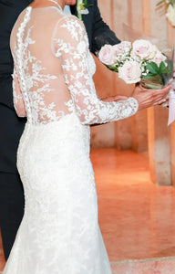 Reem Acra 'I'm Extravagent' size 6 used wedding dress side view on bride