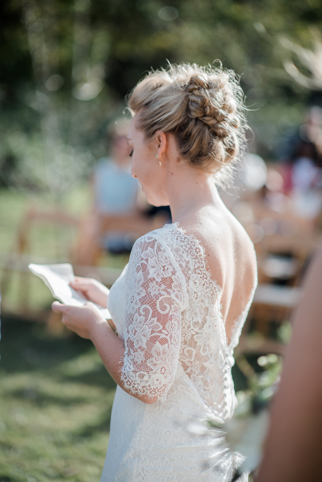 Maggie Sottero 'McKenzie' size 8 used wedding dress side view on bride