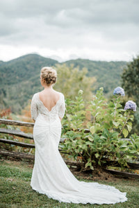 Maggie Sottero 'McKenzie' size 8 used wedding dress back view on bride