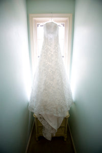 Marisa 'Romantic' size 2 used wedding dress front view on hanger