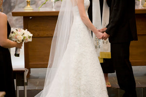 Marisa 'Romantic' size 2 used wedding dress side view on bride