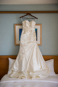 Pronovias 'Tigris' size 4 used wedding dress front view on hanger