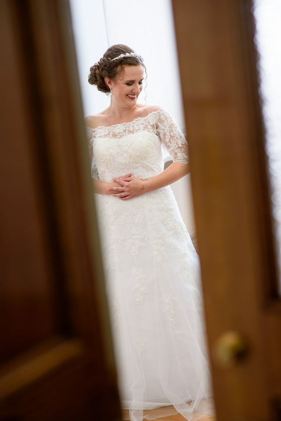 Davids Bridal 'Jewel' size 6 used wedding dress  front view on bride