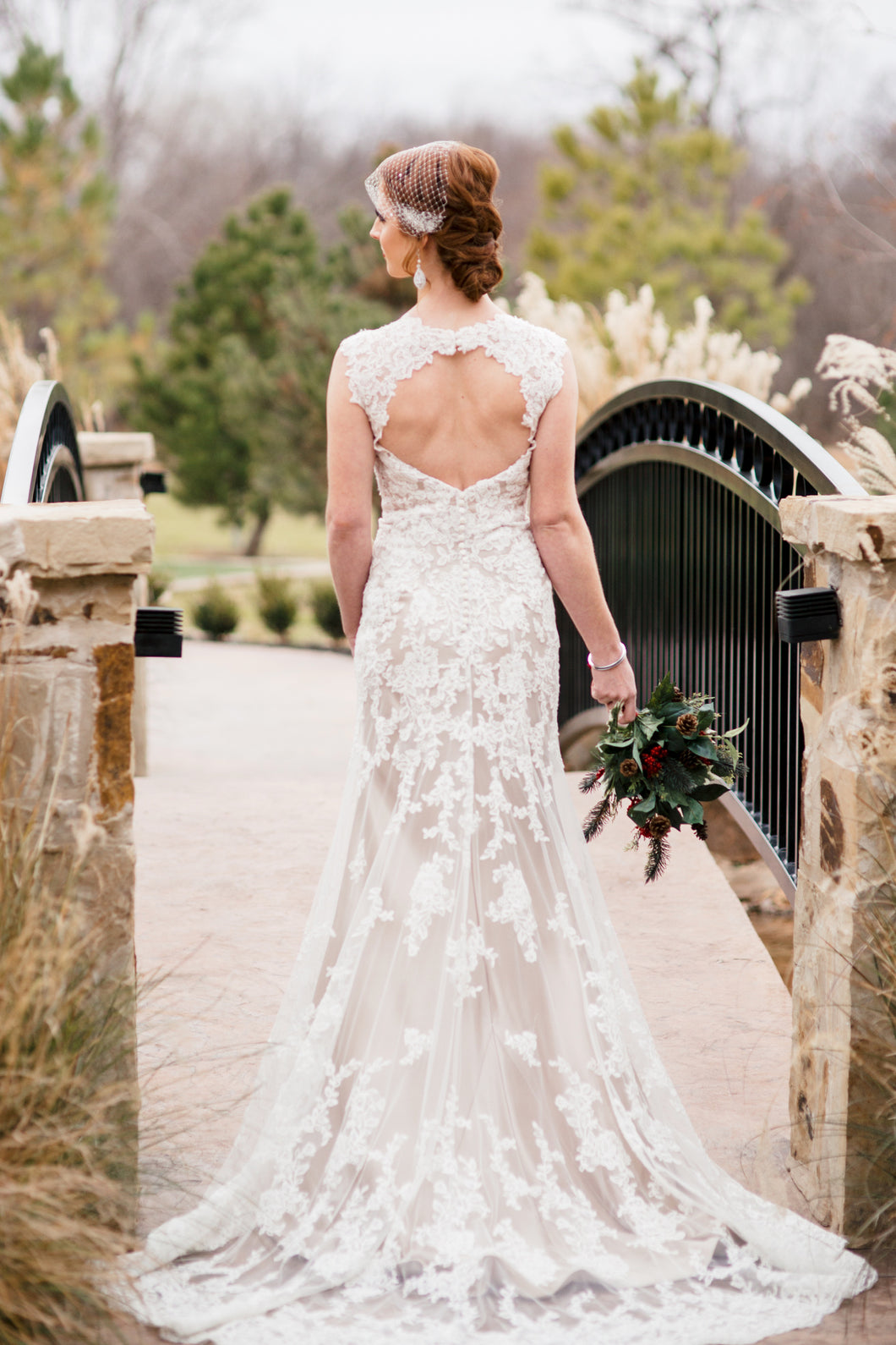 David Tutera 'Lourdes' size 4 used wedding dress back view on bride