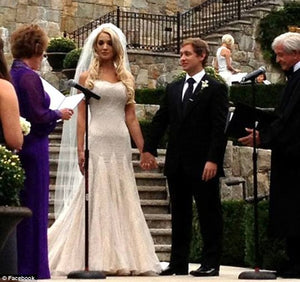 Mark Zunino 'Stunning' size 4 used wedding dress front view on bride