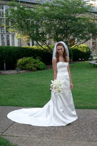 Rivini 'Etoile' size 2 used wedding dress front view on bride