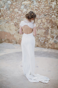 Suzanne Neville 'The Regency' size 4 used wedding dress back view on bride