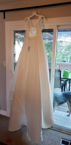 David's Bridal 'Beaded' size 12 new wedding dress back view on hanger