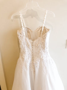 Pronovias 'Custom' size 2 used wedding dress back view on hanger