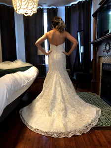 Modern Trousseau 'Sailor' size 12 used wedding dress back view on bride