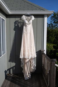 Essence of Australia 'D1999' size 12 used wedding dress front view on hanger
