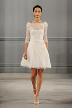 Load image into Gallery viewer, Monique Lhuillier &#39;Vignette&#39; size 18 used wedding dress on model
