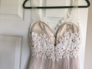 BHLDN 'Heritage' size 4 used wedding dress back view on hanger