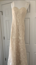Load image into Gallery viewer, Essense of Australia &#39;Romantic Vintage Lace&#39; size 8 used wedding dress front view on hanger
