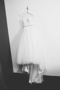 Sincerity 'Lacy' size 8 used wedding dress front view on hanger