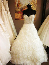 Load image into Gallery viewer, Lazaro &#39;Ivory Organza 3161&#39; size 6 used wedding dress front view on mannequin

