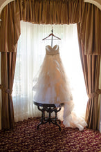 Load image into Gallery viewer, Martina Liana &#39;821&#39; size 8 used wedding dress front view on hanger
