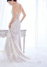 Load image into Gallery viewer, Kenneth Winston &#39;Private Label&#39; size 8 used wedding dress  back view on model
