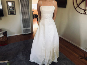 Paloma Blanca 'Blue Bird' size 8 used wedding dress front view on bride