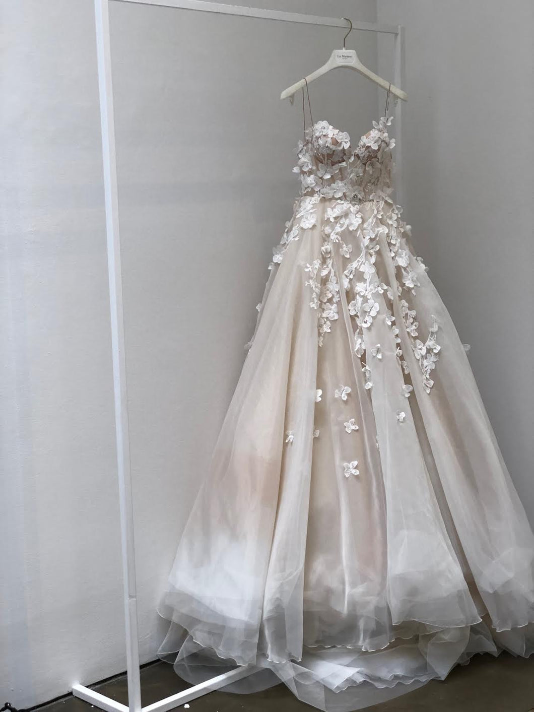 Liz Martinez 'Colette' size 8 sample wedding dress front view on hanger