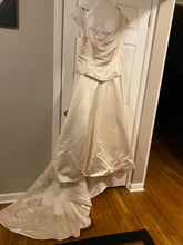 Load image into Gallery viewer, Custom &#39;A Line&#39; size 20 used wedding dress front view on hanger
