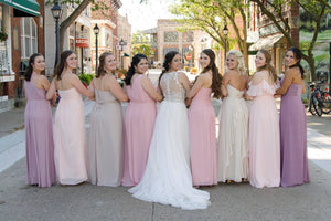 Designer Boutique 'A Line' size 10 used wedding dress back view on bride
