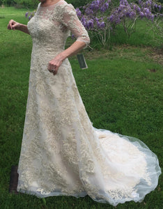 Oleg Cassini 'CWG630' size 6 new wedding dress side view on bride