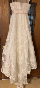 Casablanca '1900' size 10 used wedding dress back view on hanger