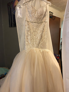 Maggie Sottero 'Lansing' size 10 used wedding dress front view on hanger