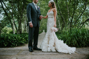 Lazaro 'Beaded Petal' size 2 used wedding dress side view on bride