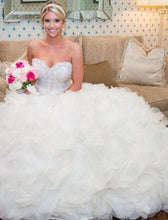 Load image into Gallery viewer, Lazaro &#39;Ivory Organza 3161&#39; size 6 used wedding dress front view on bride
