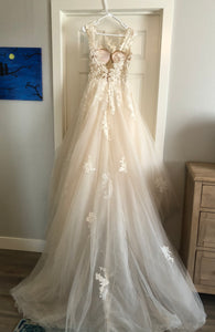 Pronovias 'Ofelia' size 6 used wedding dress back view on hanger