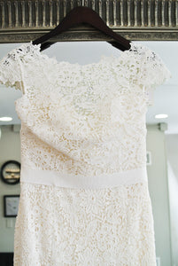 Amy Kuschel 'Babe' size 10 sample wedding dress back view on hanger