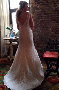 Custom 'Madeline' size 6 used wedding dress back view on bride