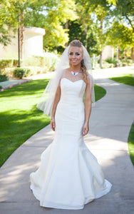 Kirstie Kelly 'Vienna' size 2 used wedding dress front view on bride