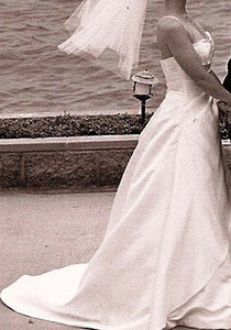 Demetrios 'Beautiful' size 8 used wedding dress side view on bride