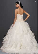 Load image into Gallery viewer, Oleg Cassini &#39;Strapless Ruffled&#39; size 6 used wedding dress back view on model
