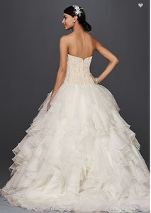 Oleg Cassini 'Strapless Ruffled' size 6 used wedding dress back view on model