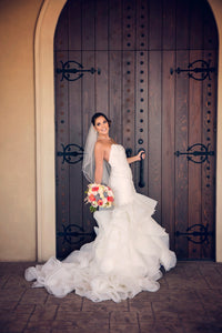 Justin Alexander '9766' size 6 used wedding dress side view on bride