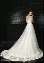 Load image into Gallery viewer, Intuzuri &#39;Aracelia&#39; size 10 used wedding dress back view on model
