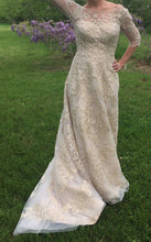 Load image into Gallery viewer, Oleg Cassini &#39;CWG630&#39; size 6 new wedding dress front view on bride
