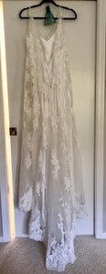 Maggie Sottero 'Trumpet Lace' size 14 sample wedding dress back view on hanger