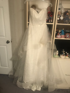 Marisa 'Morilee' size 2 sample wedding dress front view on hanger