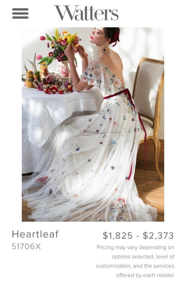 Watters 'Heartleaf 51706X' size 6 used wedding dress side view on bride