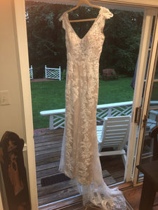 BHLDN 'Milano' size 8 used wedding dress front view on hanger