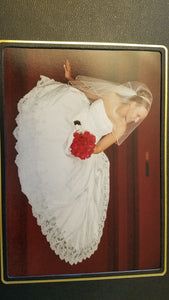David's Bridal 'Michelangelo V8377' size 14 used wedding dress side view on bride