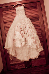 Ysa Makino 'Beautiful Handmade Flowers' size 6 used wedding dress front view on hanger