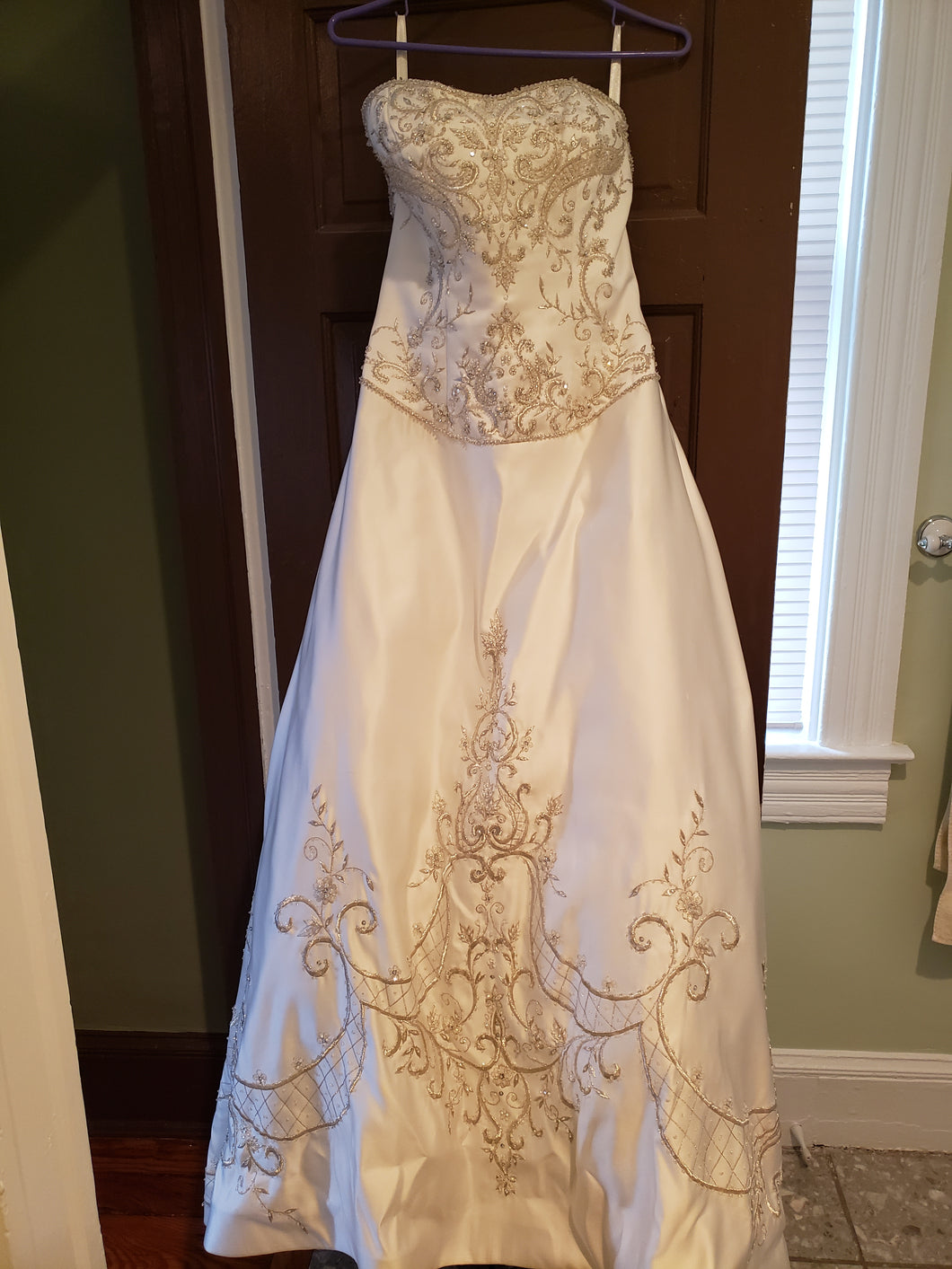 P2 '39' size 10 used wedding dress front view on hanger
