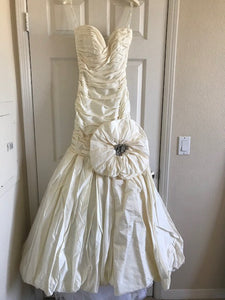 Ines Di Santo 'Turquoise' size 4 used wedding dress front view on hanger