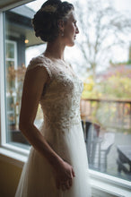 Load image into Gallery viewer, Maggie Sottero &#39;Caitlyn&#39; size 12 used wedding dress side view on bride
